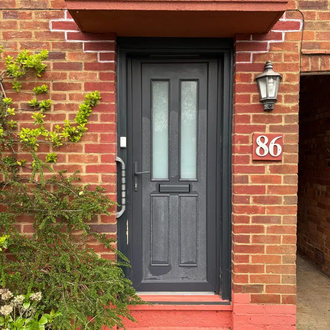 Jammed and poorly fitted old front door before replacement in Botley, Oxfordshire.